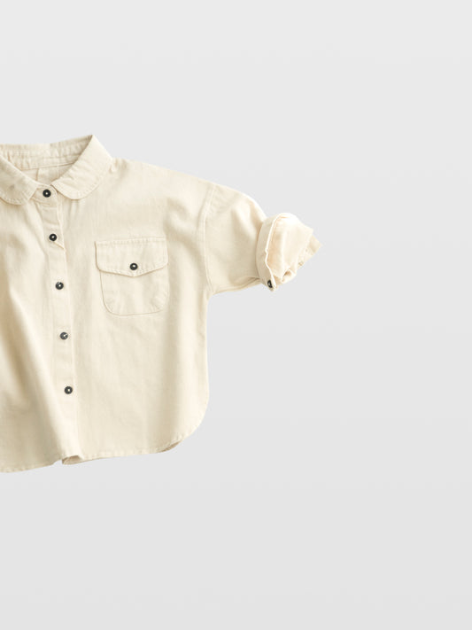 Club Enzo cream canvas cotton long sleeve button up with collar and small front pocket and black buttons for trendy cool kids boys girls toddler  babies mom must haves overshirt jacket wide relaxed fit for layering made in Los Angeles online kids clothing store boutique near me 